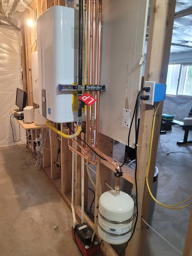 Licensed plumber repairing a kitchen sink in Alpine